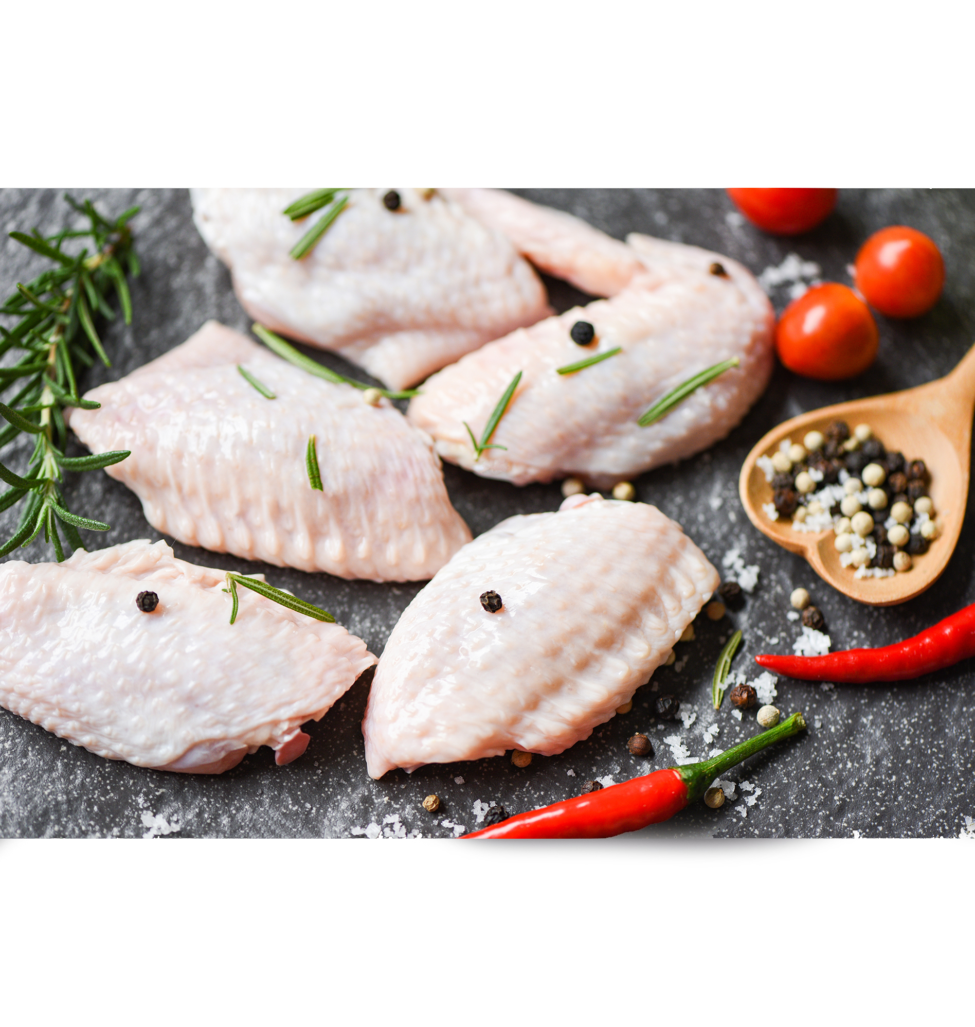 بکام فود | تأمین مرغ منجمد raw chicken wings, herbs and spices with pepper chili tomato gar